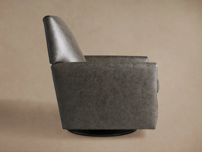 Grey textured Harvey Leather Swivel Recliner, seen from the back-left, featuring a high back, square arms, and black swivel base.