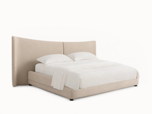 Hathaway Extended Bed: Light beige upholstered platform bed with extended winged headboard and white striped bedding.