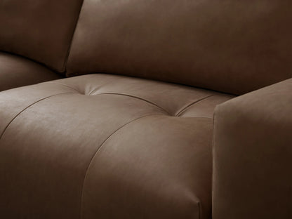 A brown leather Keegan Five-Piece Sectional with wide, cushioned seats and backrests, arranged in an L-shape on a wooden floor.