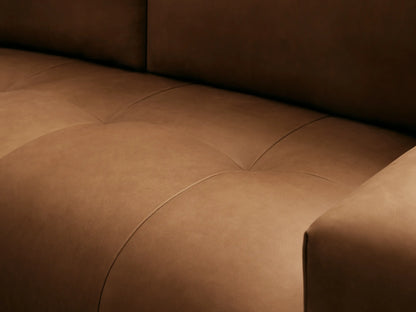 Keegan Leather Sofa: A modern, sleek, light brown leather sofa with two back cushions and wide arms on a wooden floor.