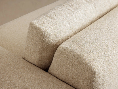Keegan Tailored Sofa. Modern off-white textured fabric sofa with sharp block arms and two plush back cushions, on wood floor.