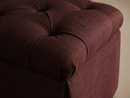 Top view of a burgundy Liddie Square Ottoman, showing the tufted top with button details.