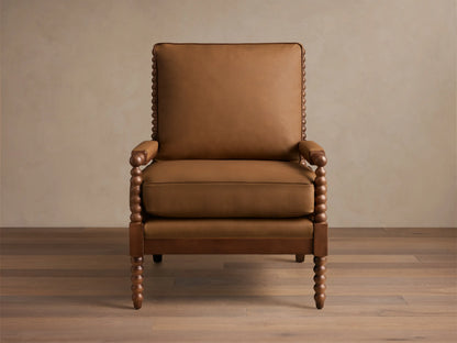 Rear view of the brown Milly Leather Chair, showcasing bobbin-turned spindle back and armrests.