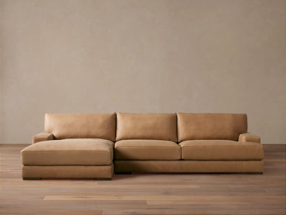 Norwalk Leather Two-Piece Chaise Sectional in tan leather; chaise on left, three back cushions, sleek and contemporary design on wooden floor.