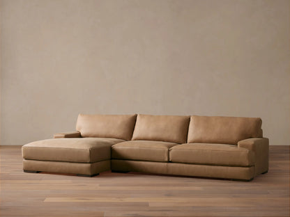 Norwalk Leather Two-Piece Chaise Sectional in tan leather; chaise on left, three back cushions, sleek and contemporary design on wooden floor.