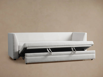 Pavo Trundle Sleeper Sofa in Barbados Cream fabric, shown from the back with two cushioned backrests against a beige background.