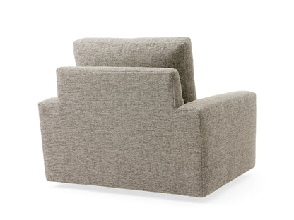 Front view of Remington Outdoor Swivel Chair with gray textured fabric, featuring thick cushioned seat, back, and armrests, set against a coastal backdrop.