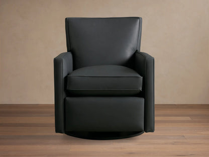 Rudy Leather Swivel Recliner, a sleek black leather armchair with thin arms, on wood floor against a neutral wall.