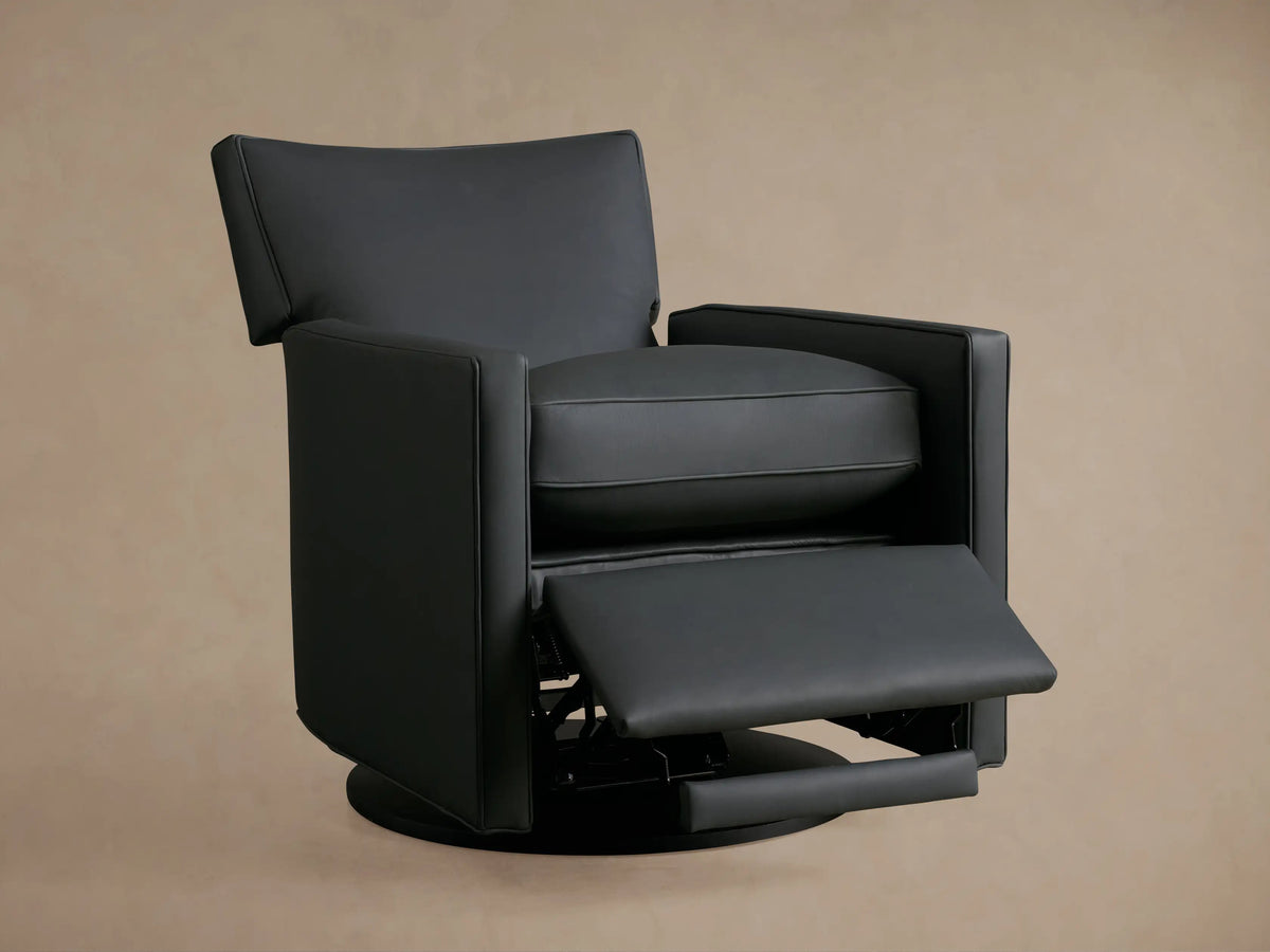 Side view of a dark grey Rudy Leather Swivel Recliner, partially reclined with its footrest extended, against a plain background.