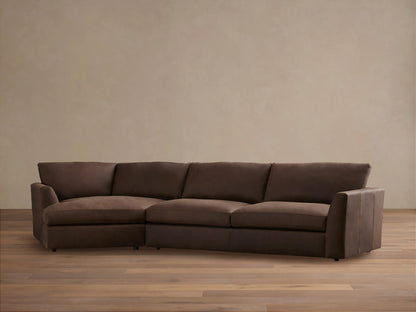Vernon Leather Two-Piece Cuddle Chaise Sectional in rich brown leather. Left-side chaise, right armrest, plush cushions on hardwood floor.