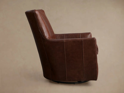 Side profile of a Brown Walton Leather Swivel Glider, showing vertical stitching on the arm and back with a dark swivel base.