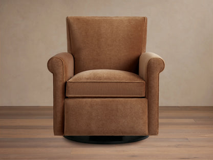 Rudy Rolled Arm Swivel Recliner in cognac velvet, featuring a high back, plush seat cushion, and rounded arms on a wooden floor.