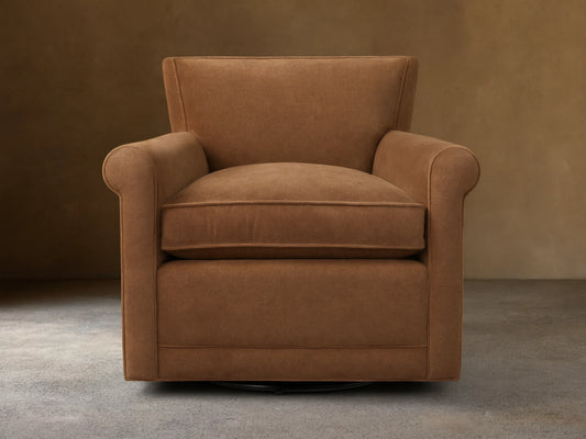 Rudy Rolled Arm Swivel Chair in Banks Cognac, featuring rolled arms, plush seat cushion, and 360-degree swivel on a neutral background.