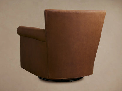 Rudy Leather Rolled Arm Swivel Chair in brown leather, side view showing rolled arms and a smooth finish on a swiveling base.