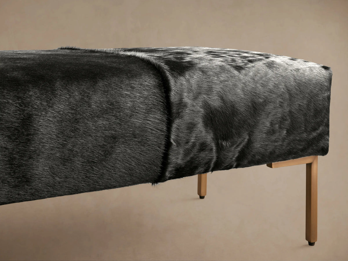 Tilton Nubuck Leather Bench in dark gray with a velvet-like texture, featuring a rectangular cushioned top and sleek, slender legs.