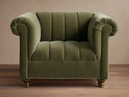 Front view of a green Berwick Channeled Chair with channel-stitched back and seat, rolled arms, and wooden feet.