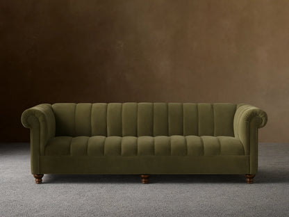 Front view of the olive green Berwick Channeled Sofa with channel-stitched back and seat, rolled arms, and turned wooden legs.