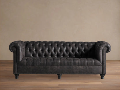 Berwick Faux Leather Sofa, dark steel grey, Chesterfield style with deep tufting, rolled arms, and nailhead trim.