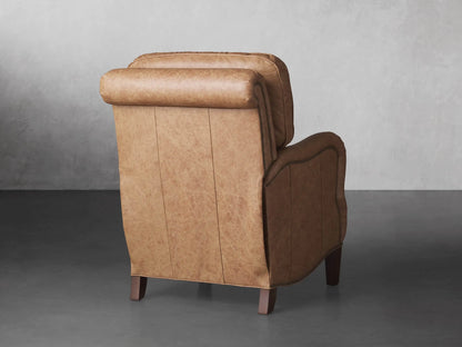 Brooklyn Leather Recliner, tan, in a reclined position with extended footrest, displaying nailhead trim detail.