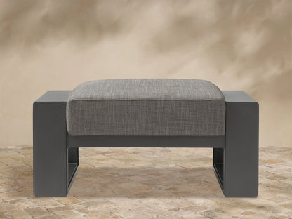 Canyon Outdoor Aluminum Ottoman: dark gray rectangular frame with a light gray textured, square cushion, shown front view.
