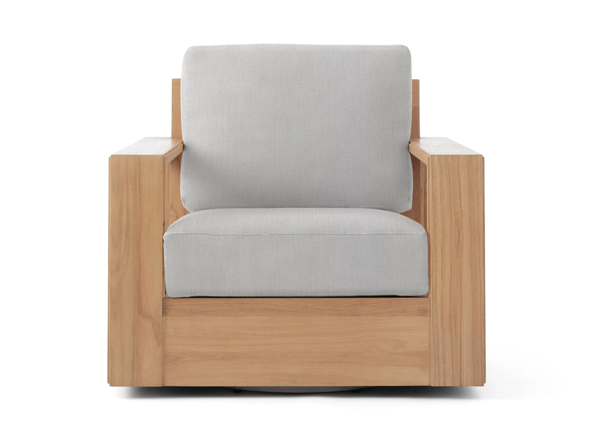 Front view of Canyon Outdoor Teak Swivel Chair. Light brown teak frame with wide arms and light gray back and seat cushions.