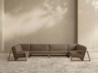 Canyon Outdoor Teak Sectional: U-shaped, medium brown teak frame with open geometric armrests, dark brown cushions, white background.