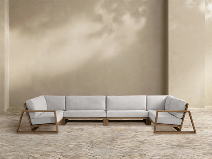 Canyon Outdoor Teak Four-Piece Sectional, U-shaped with light gray cushions and a natural brown teak wood frame.