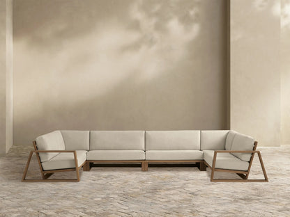 Canyon Outdoor Teak Four-Piece Sectional: U-shaped with light beige cushions and natural teak wood open-frame armrests.