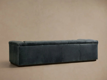 Front view of the Slate blue Cameran Leather Sofa with tufted back and arms.