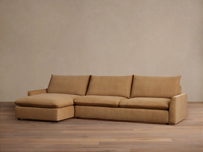 The Calistoga Two-Piece Chaise Sectional in tan fabric, featuring a left-side chaise and three-seat design, shown in a minimalist room.