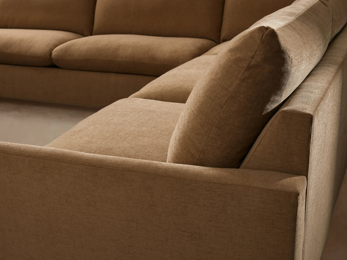 Calistoga Five-Piece Sectional in tan fabric, seen from the back, showing its relaxed design with plush cushions and clean lines.
