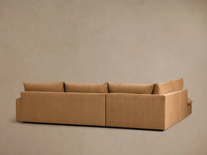 Rear view of the light brown Calistoga Three-Piece Bumper Sectional, showing the backrests and corner piece.