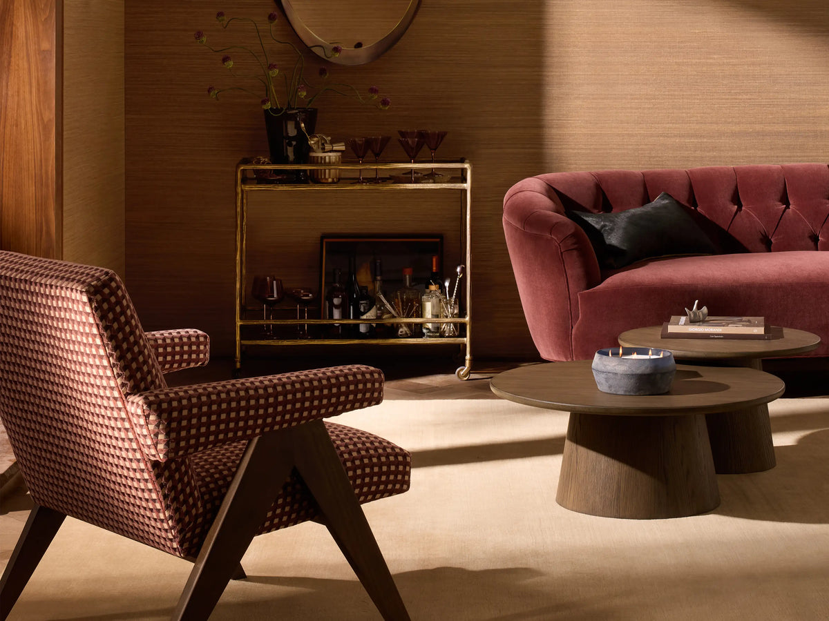 Front view of the dusty rose velvet Cortland Sofa with deep button tufting and mocha-finished turned wooden legs.
