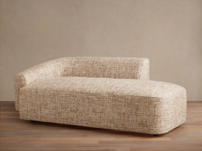 Close-up of Hamlin Daybed's textured light brown and cream woven fabric upholstery, showing backrest and cushion detail.