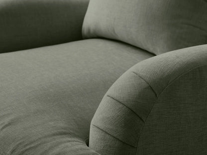 Hanover Chair: Green-grey upholstered armchair with padded, pleated rolled arms, loose back cushion, and turned wooden legs.