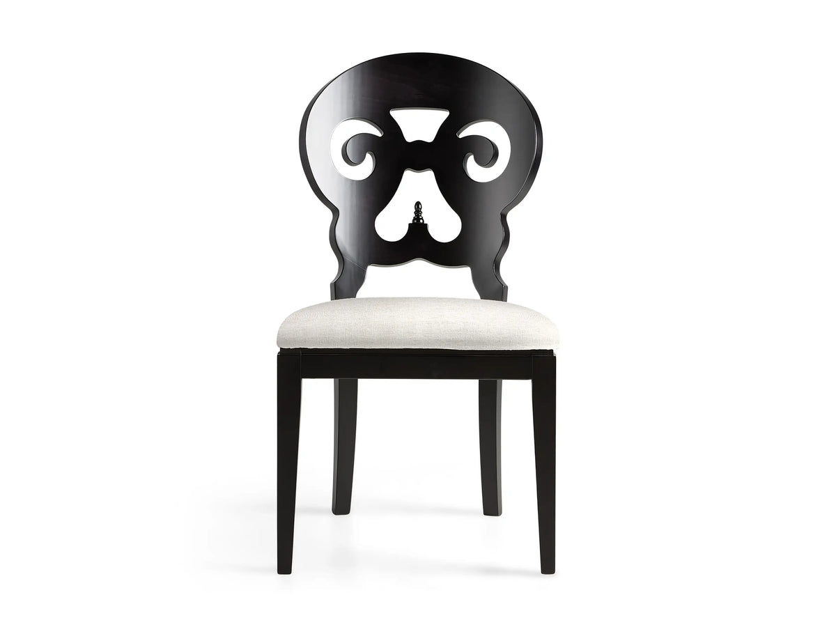 Jordan Dining Side Chair in Midnight; black wood frame with ornate back design, white padded seat, on white background.