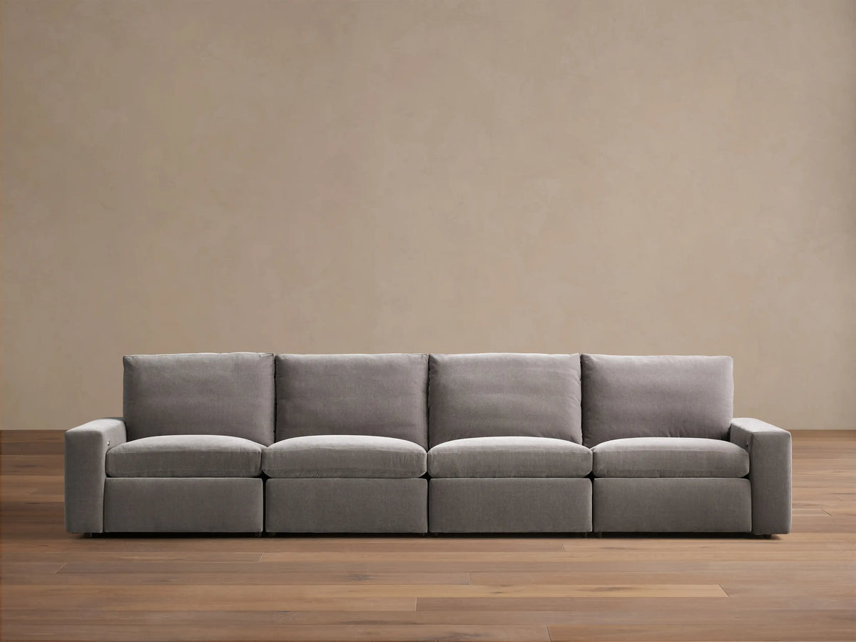Kipton Wide Arm Four-Piece Motion Modular Sofa
