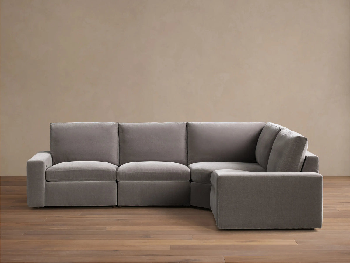 Kipton Wide Arm Four-Piece Motion Sectional