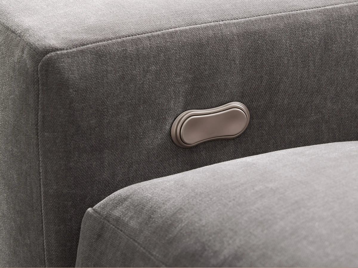 Front view of the light grey Kipton Wide Arm Six Piece Motion Sectional, an L-shaped sofa with wide arms.