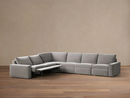 Rear view of the gray Kipton Wide Arm Six Piece Motion Sectional, showing its L-shape configuration.
