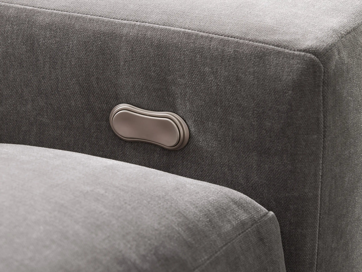 Front view of light gray Kipton Wide Arm Six Piece Motion Sectional, L-shaped, one footrest extended.
