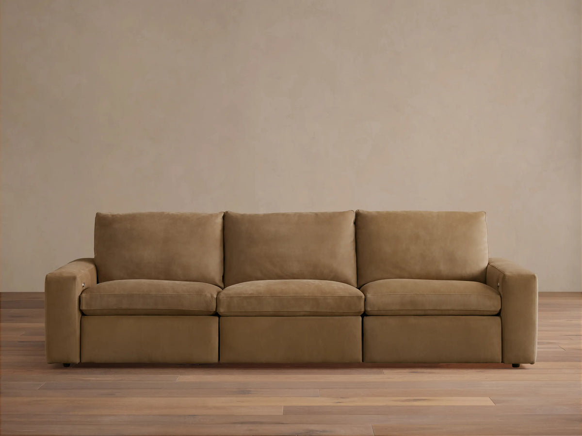 Kipton Wide Arm Nubuck Leather Sofa in brown, shown in a three-piece configuration with wide arms, set against a neutral background.