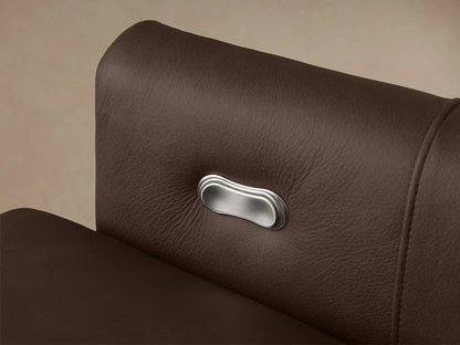Brown Kipton Leather Motion Recliner with slim arms and extended footrest; shown in a fully reclined position on a beige background.