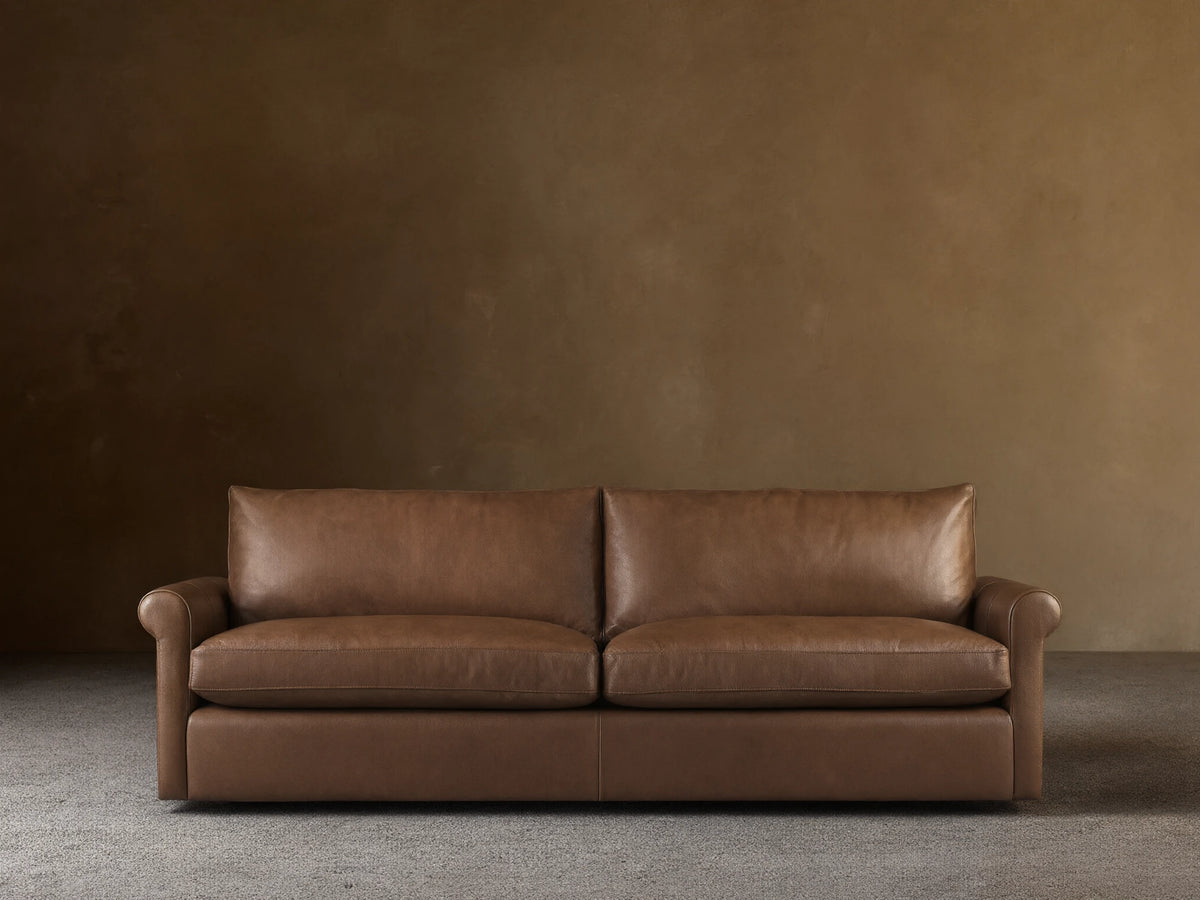 Front view of the Missouri Canyon Performance Leather Kipton Leather Rolled Arm Sofa, featuring two seat cushions and rolled arms.