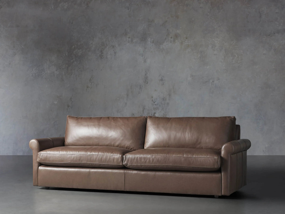 Front view of the Missouri Canyon Performance Leather Kipton Leather Rolled Arm Sofa, featuring two seat cushions and rolled arms.