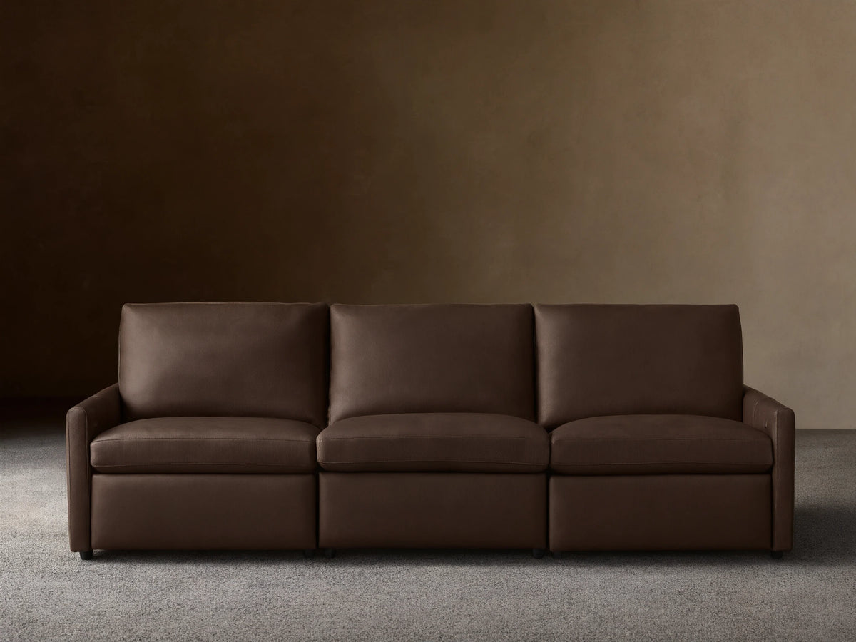 Three-piece Kipton Leather Modular Sofa with slim arms and a sleek design in dark brown leather against a neutral background.