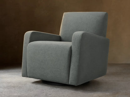 Gray upholstered Kershaw Swivel Chair with soft, textured fabric. Features wide armrests, a high backrest, and a concealed swivel base.
