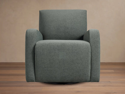 Gray upholstered Kershaw Swivel Chair with soft, textured fabric. Features wide armrests, a high backrest, and a concealed swivel base.