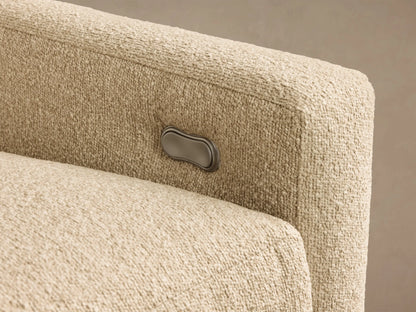 Front view of the light beige Kipton Slope Arm Three-Piece Motion Chaise Sectional with sloped arms and a left-facing chaise.
