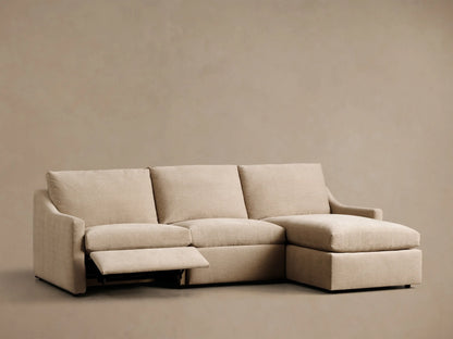 Front view of the beige Kipton Slope Arm Three-Piece Motion Chaise Sectional, featuring an L-shape design.
